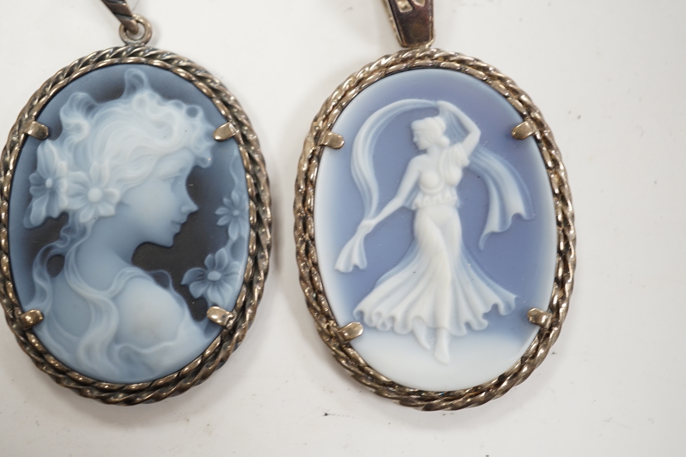 Three modern 925 or silver mounted Wedgwood style oval plaque pendants, 42mm.